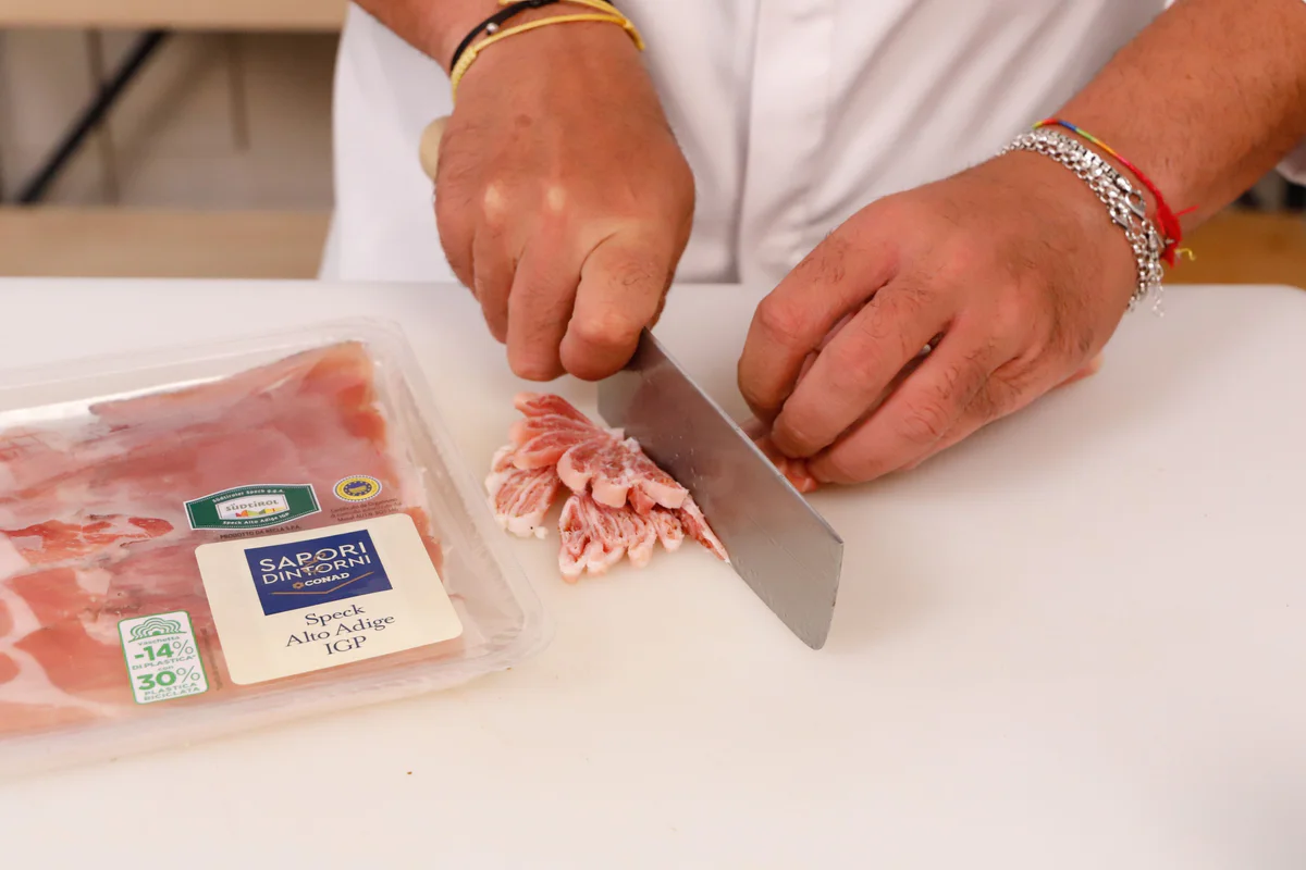 tritare lo speck